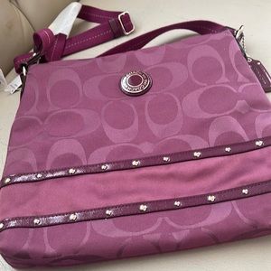Coach bag purple #G1220-F20349 used for only one month.  Excellent condition